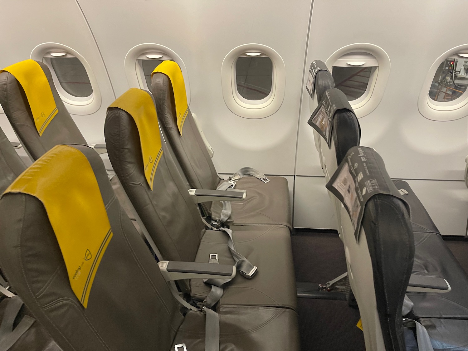 seats in an airplane with seats in the back