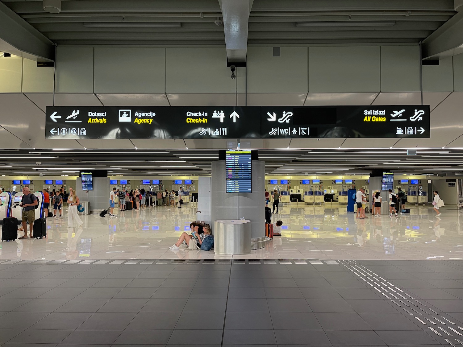 people in an airport terminal