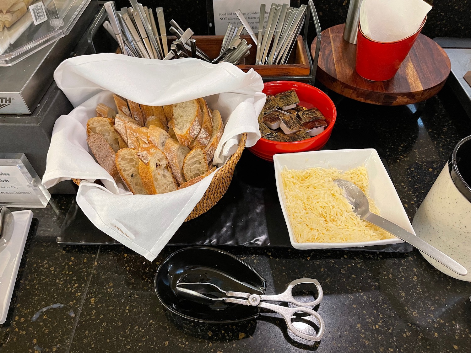 a basket of bread and cheese