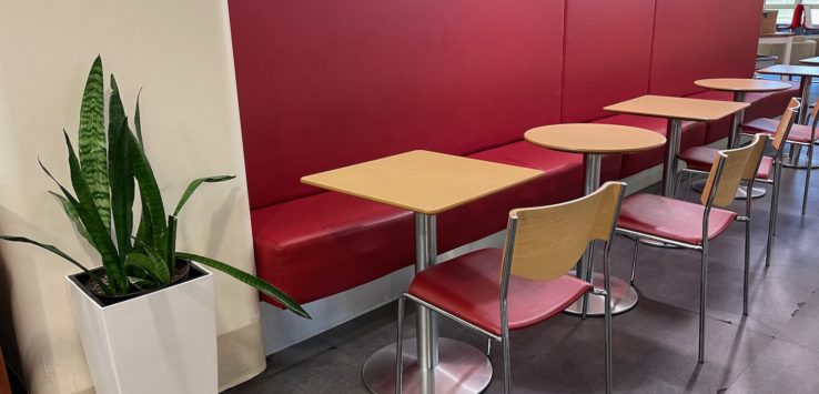 a table and chairs in a booth