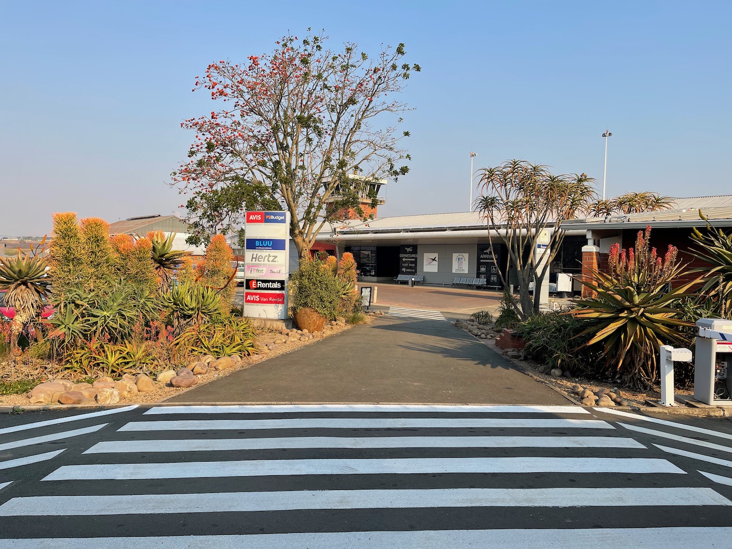 a zebra crossing in front of a building