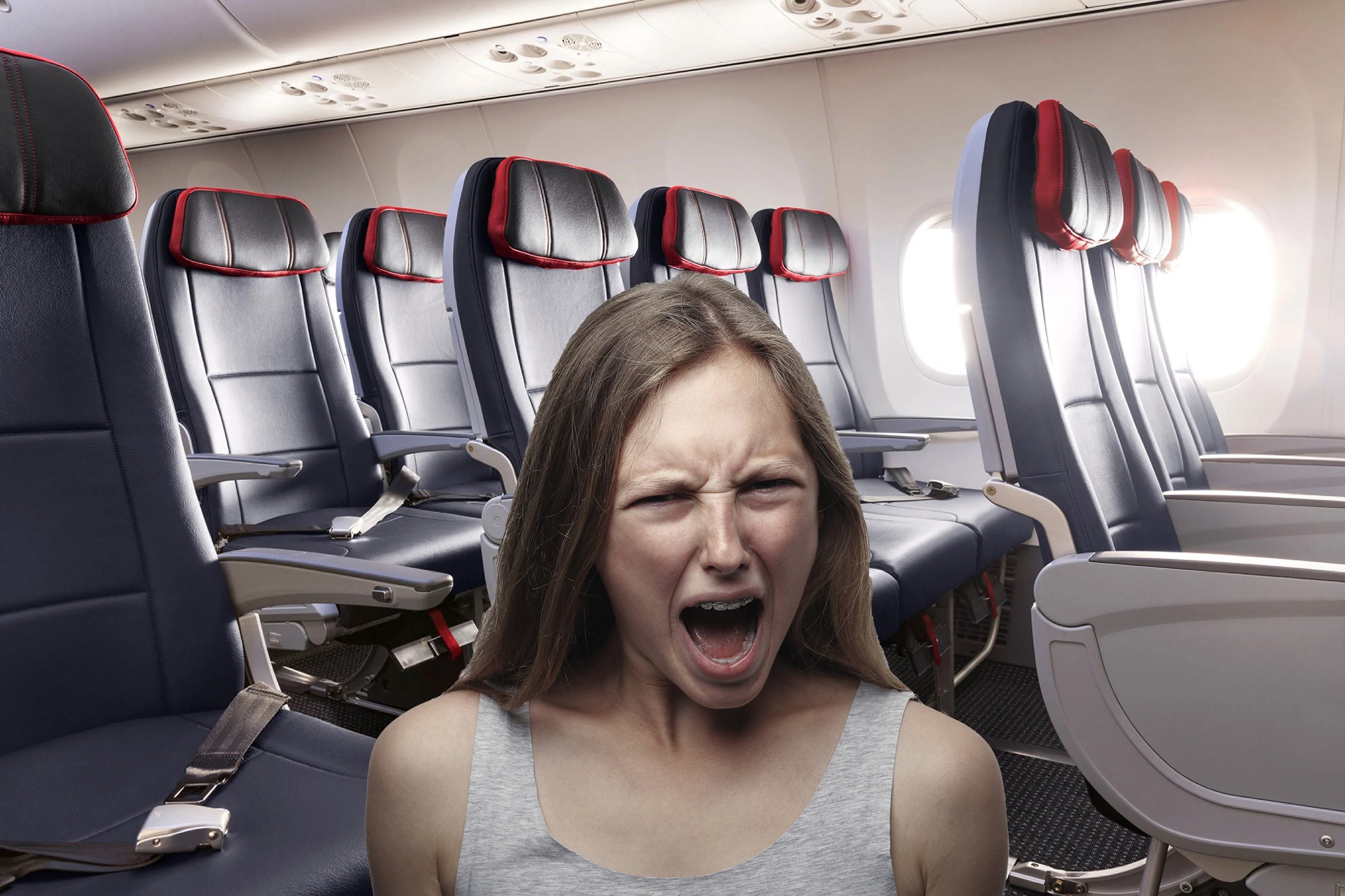a woman in an airplane with her mouth open