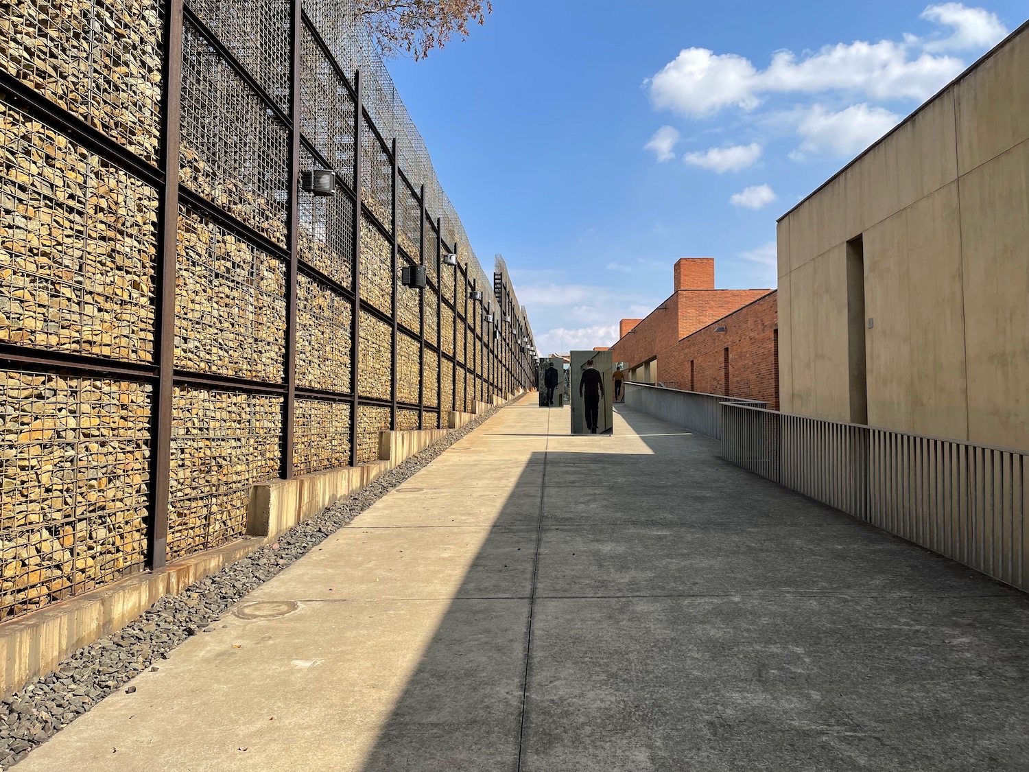 a person walking on a sidewalk