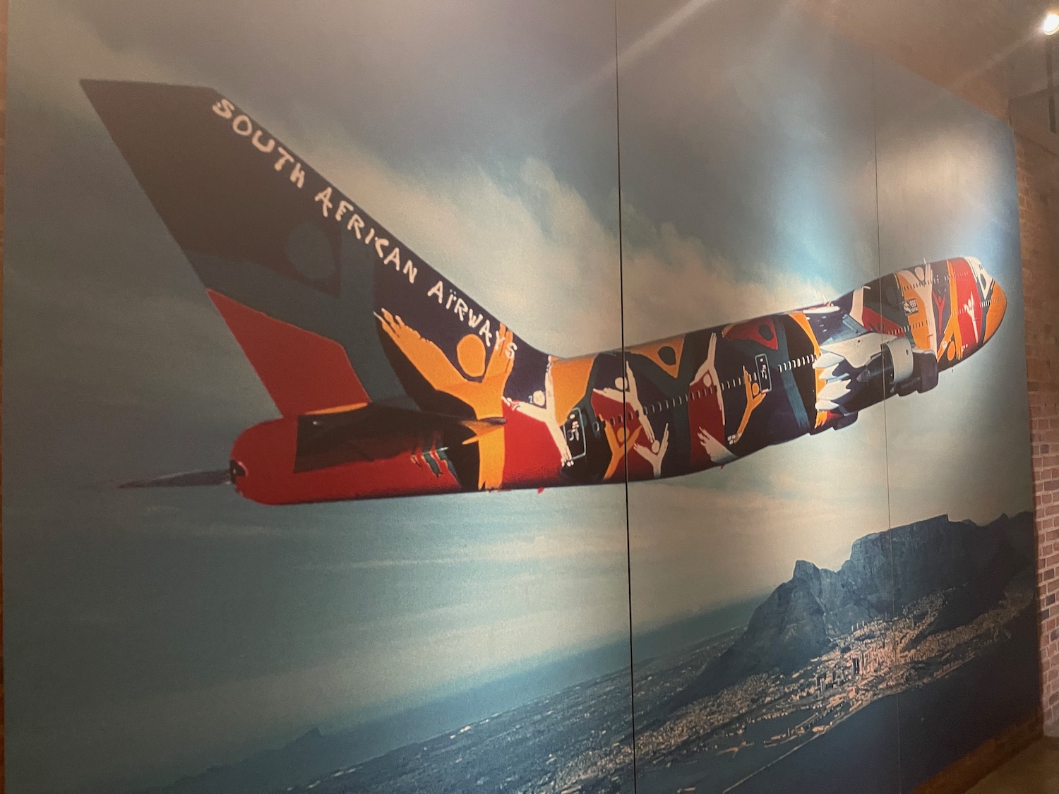 a painting of a plane on a wall