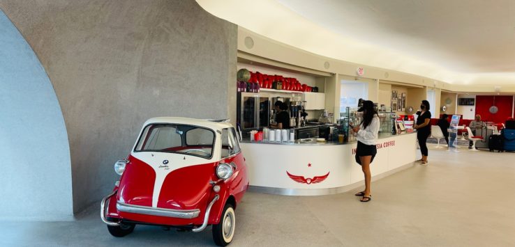 a red and white car in a building