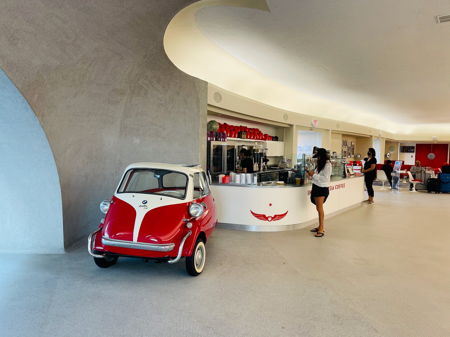 a red and white car in a building