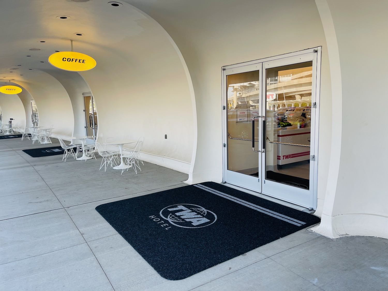 a doormat and chairs in a building