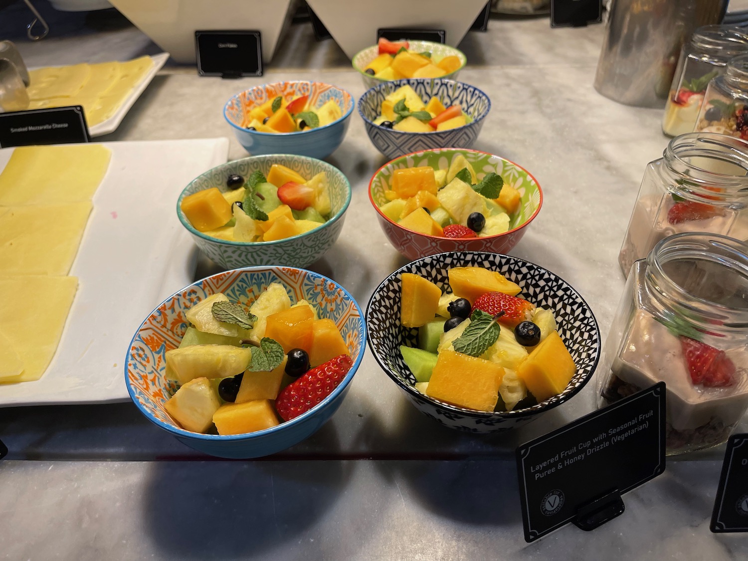 a group of bowls of fruit