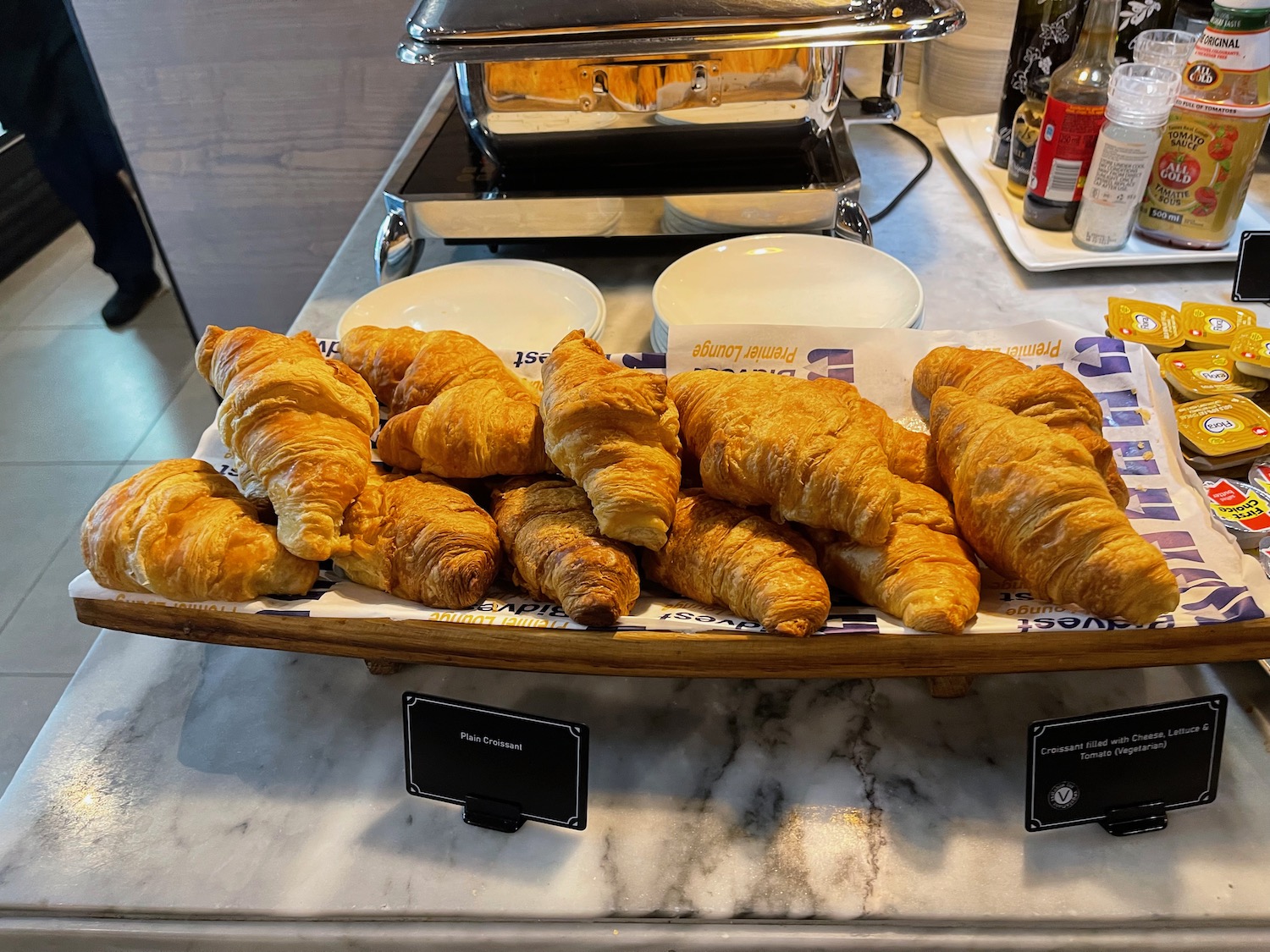 a plate of croissants on a table