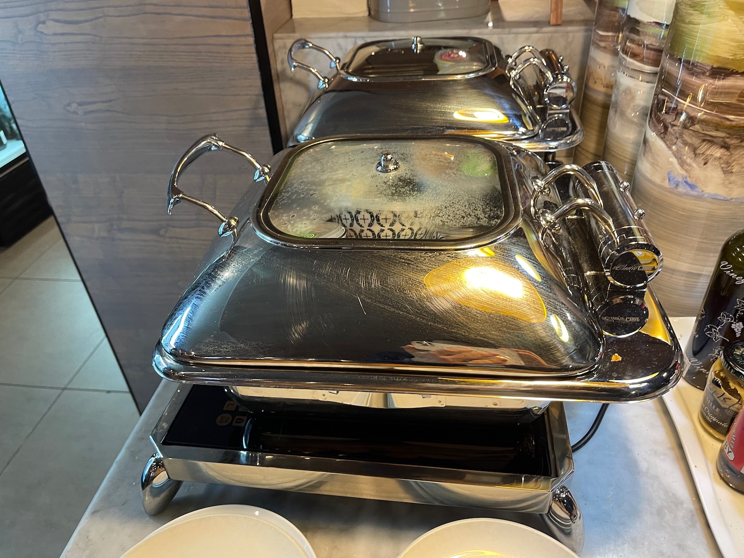 a group of silver food containers