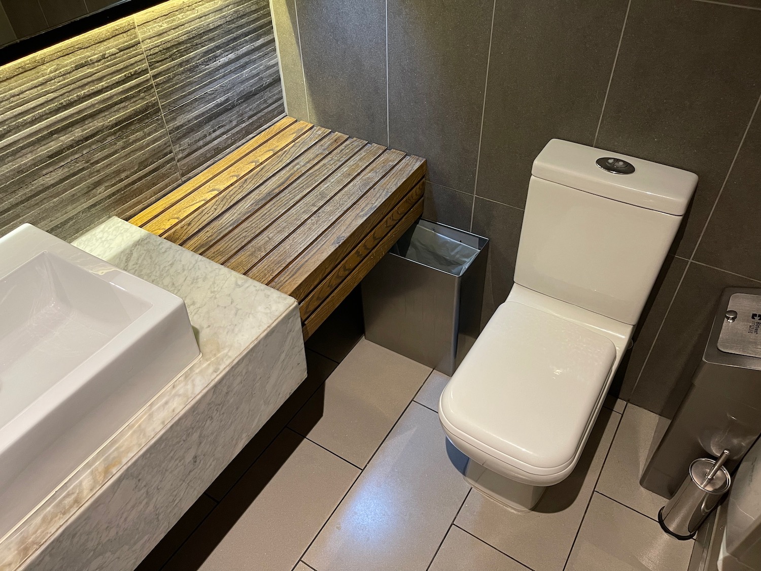 a toilet and sink in a bathroom