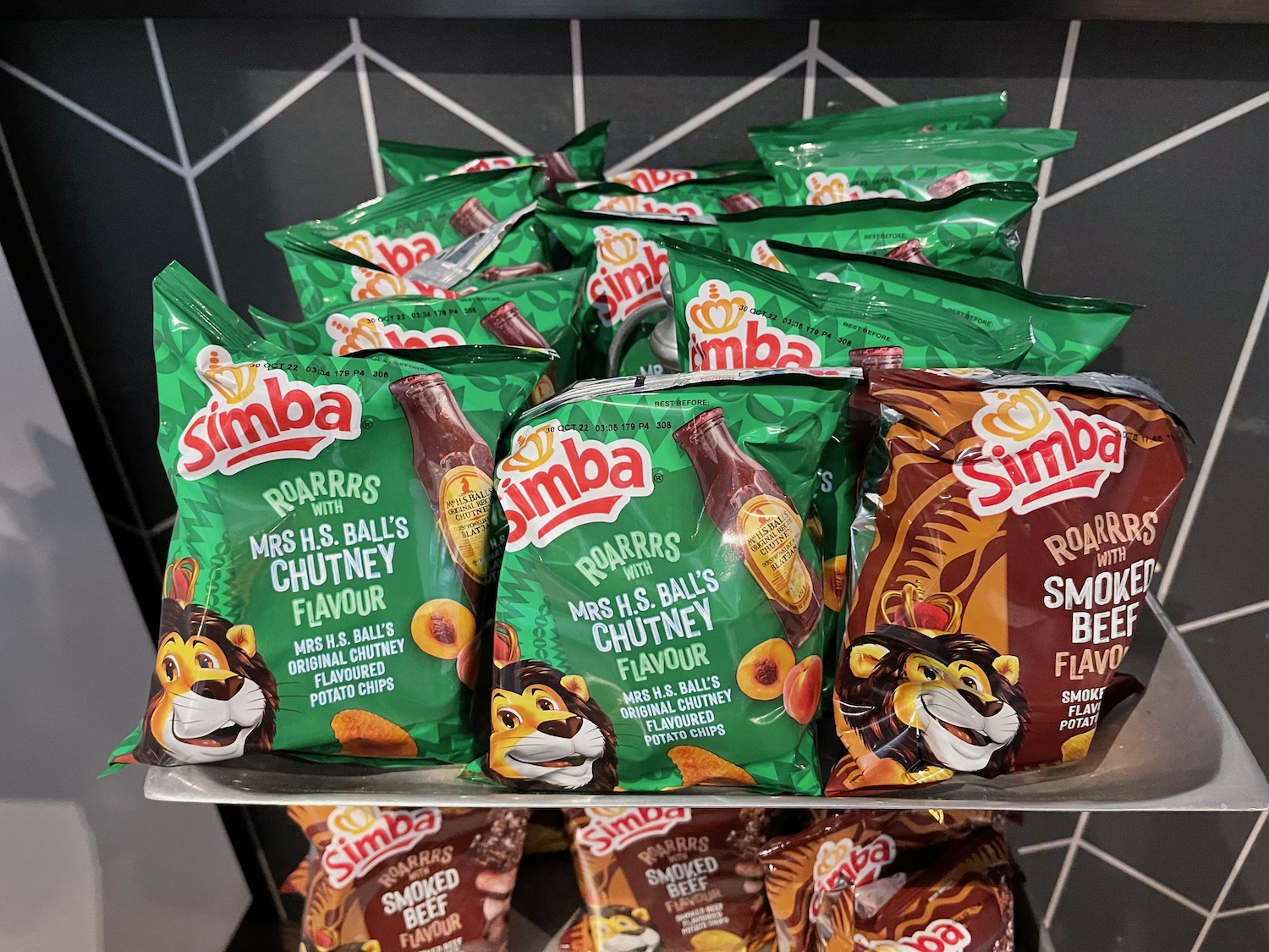 a group of bags of food on a shelf