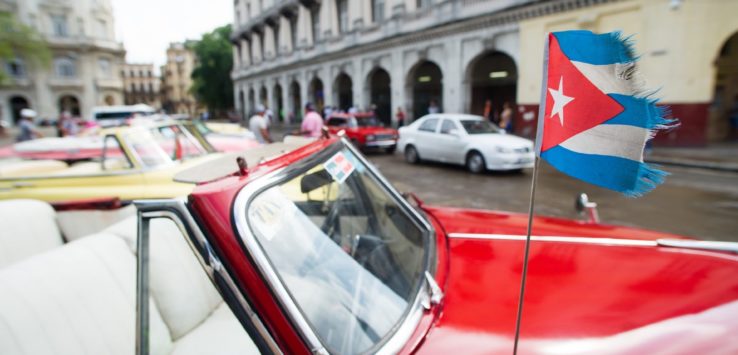 a flag on a red car