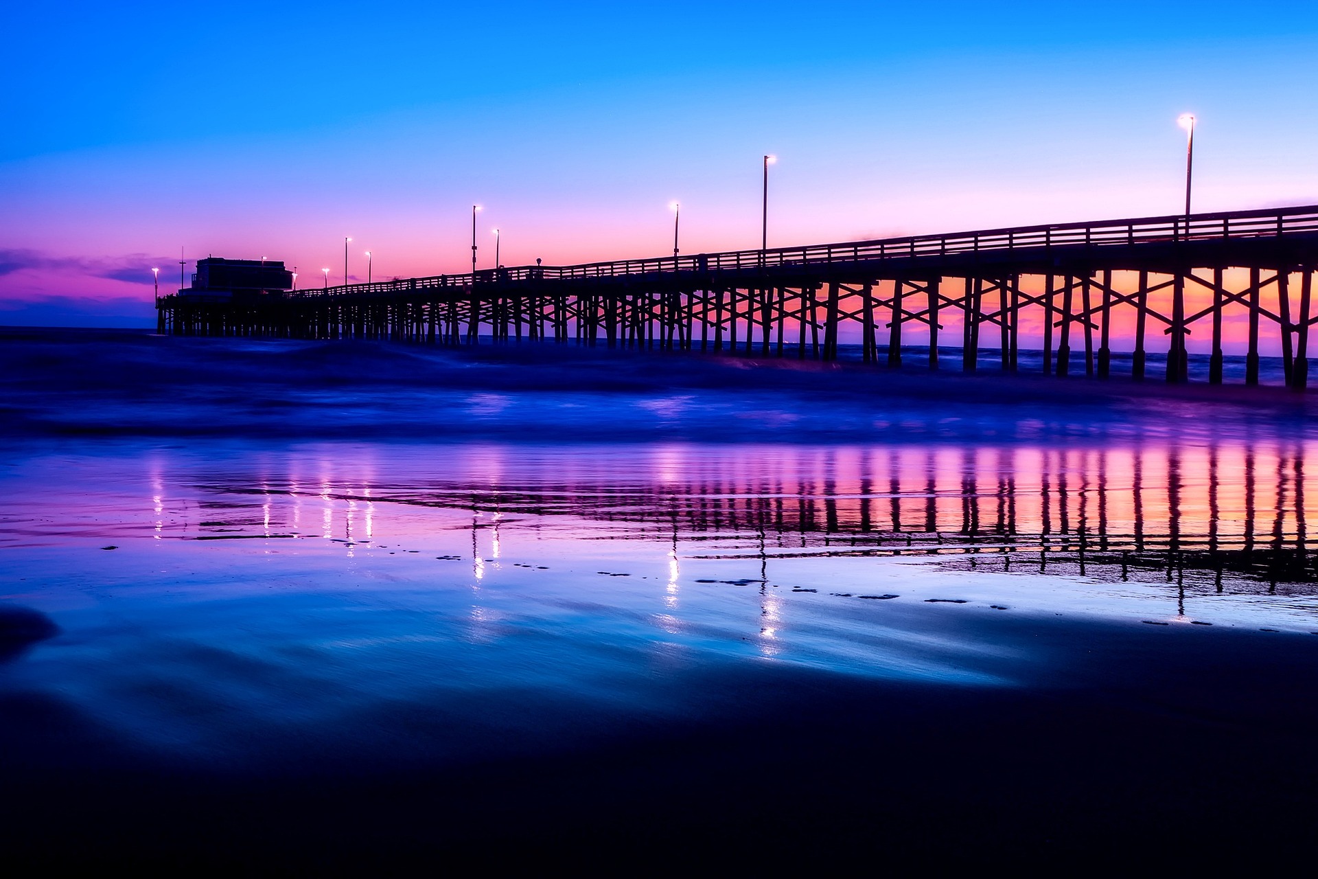 a pier with lights on it