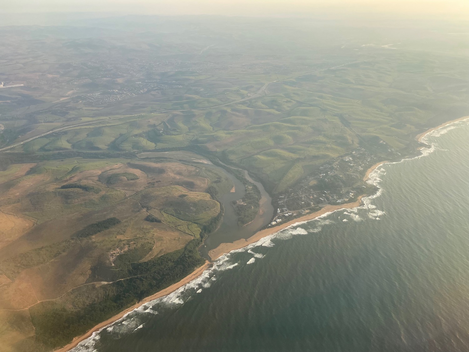 aerial view of a beach and land