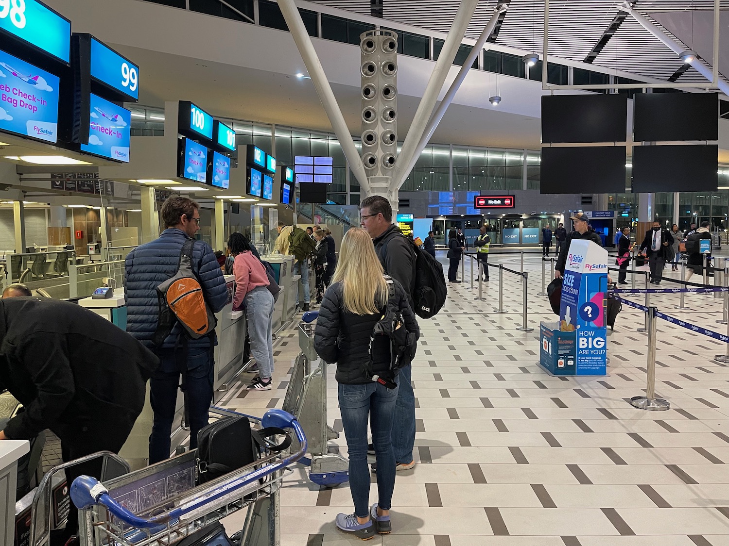 people standing in a terminal