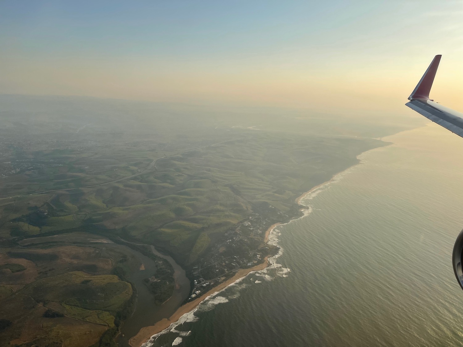 aerial view of a beach and land