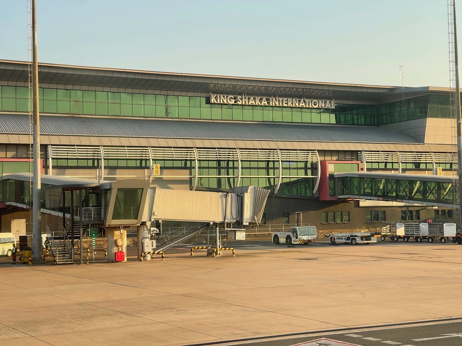 a large building with a lot of planes in front of it