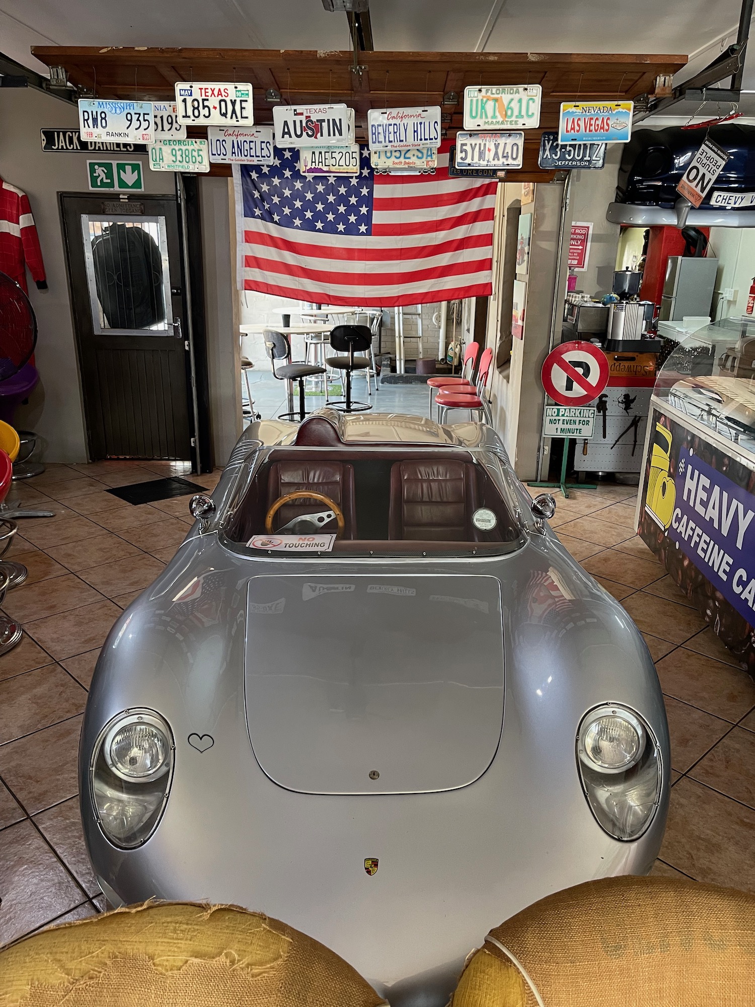 a silver sports car in a store