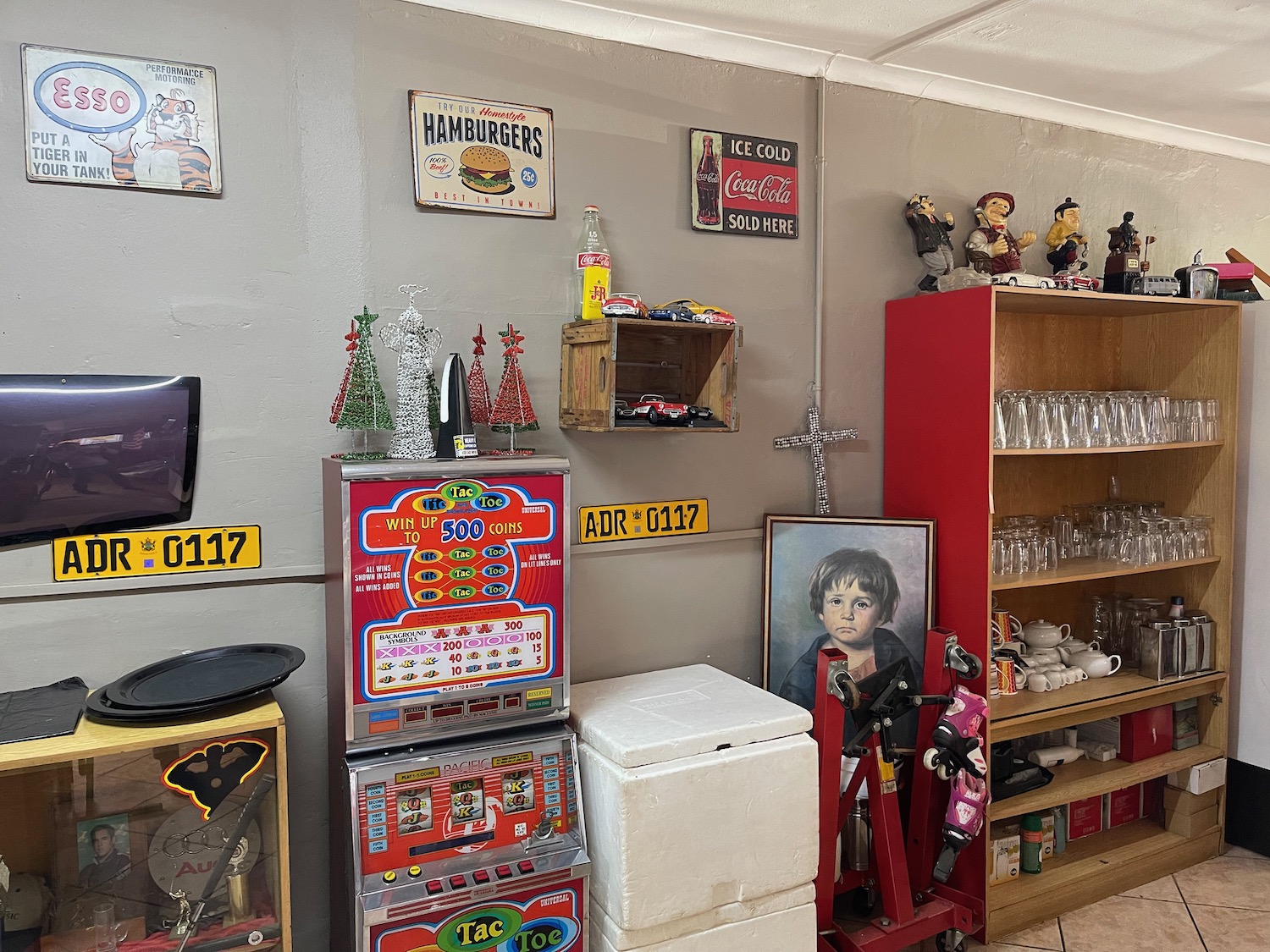 a room with a variety of objects and objects on the wall