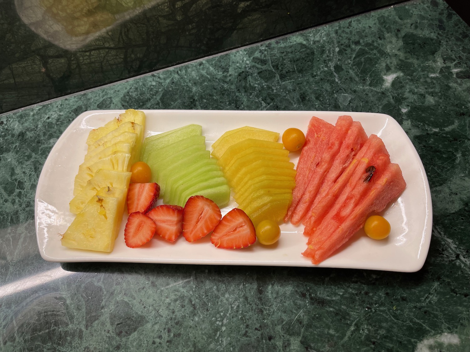 a plate of fruit on a table