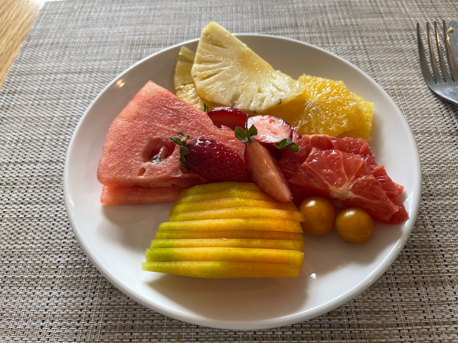 a plate of fruit on a table