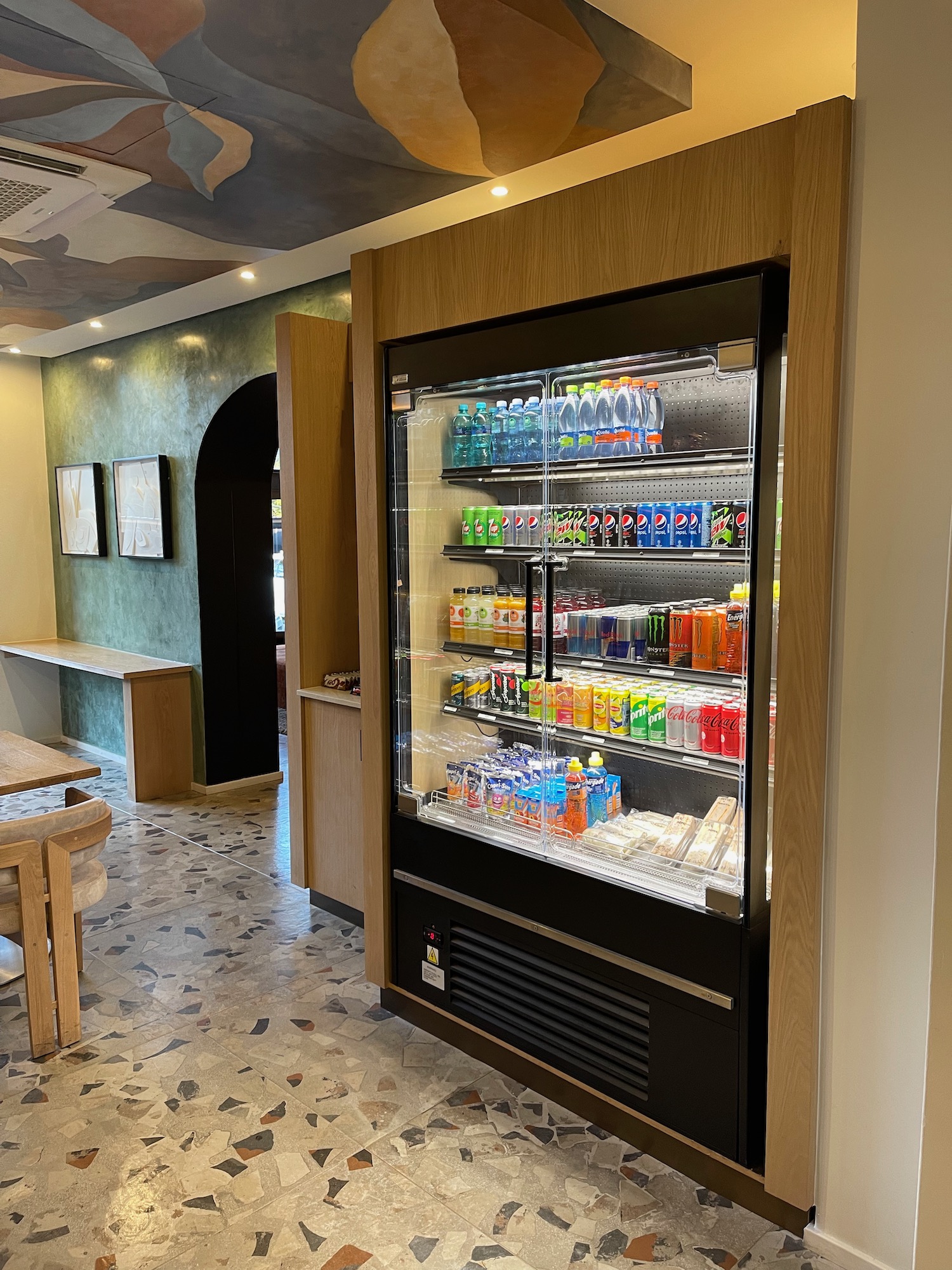 a beverage cooler in a room