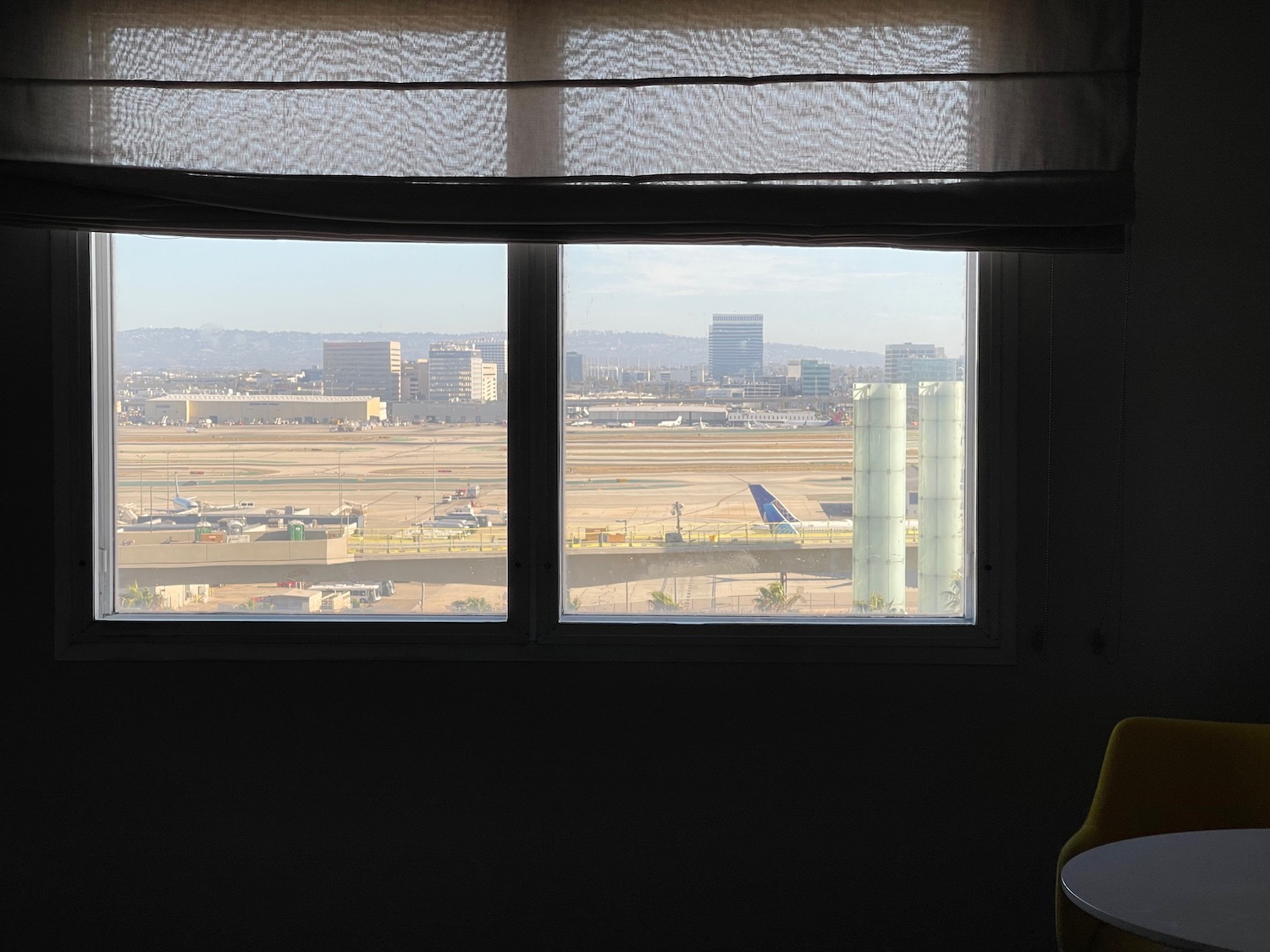 a window with a view of an airport