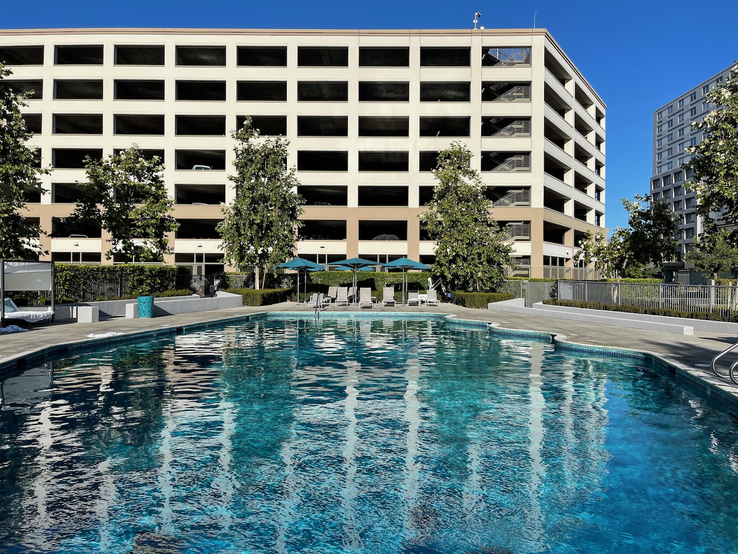 a pool in front of a building