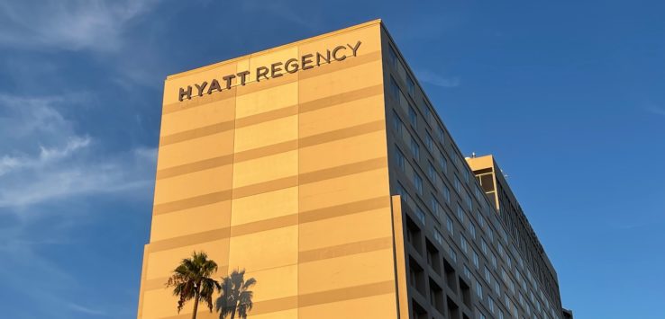 a building with palm trees