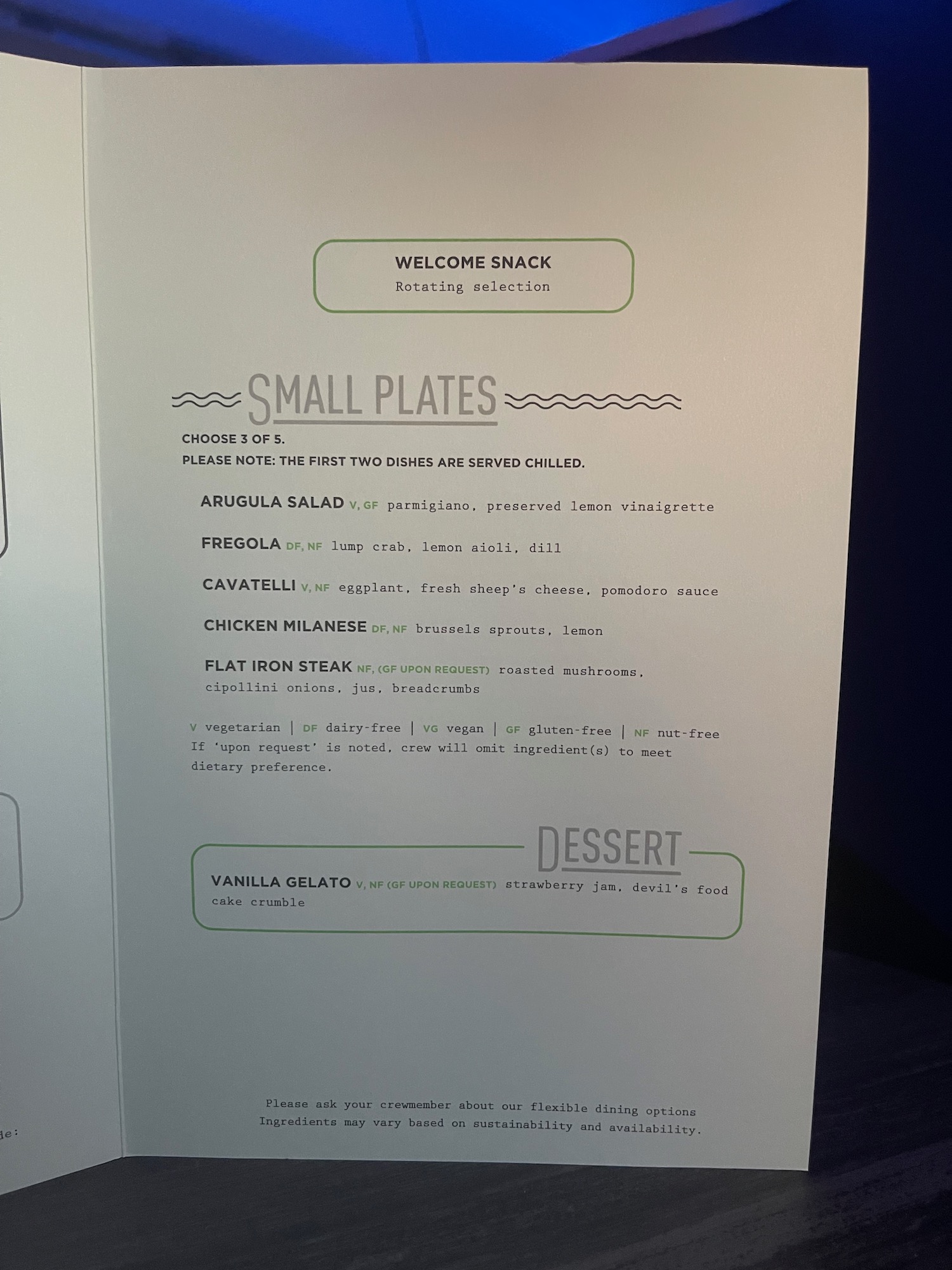 a menu on a white surface