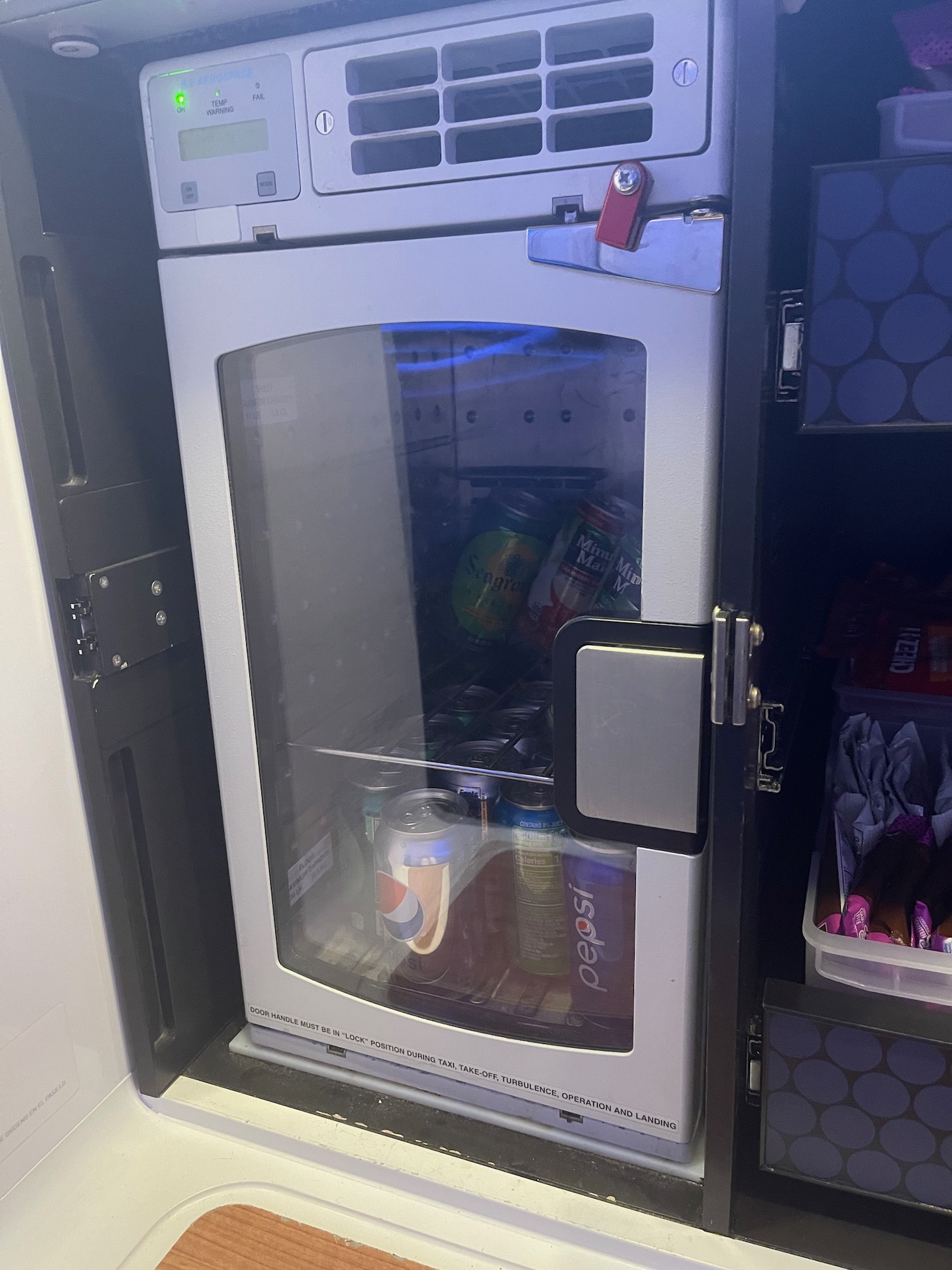 a refrigerator with drinks inside