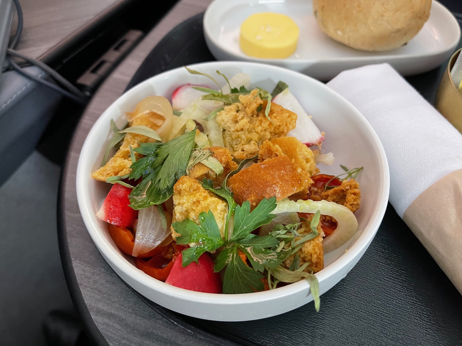 a bowl of food on a tray