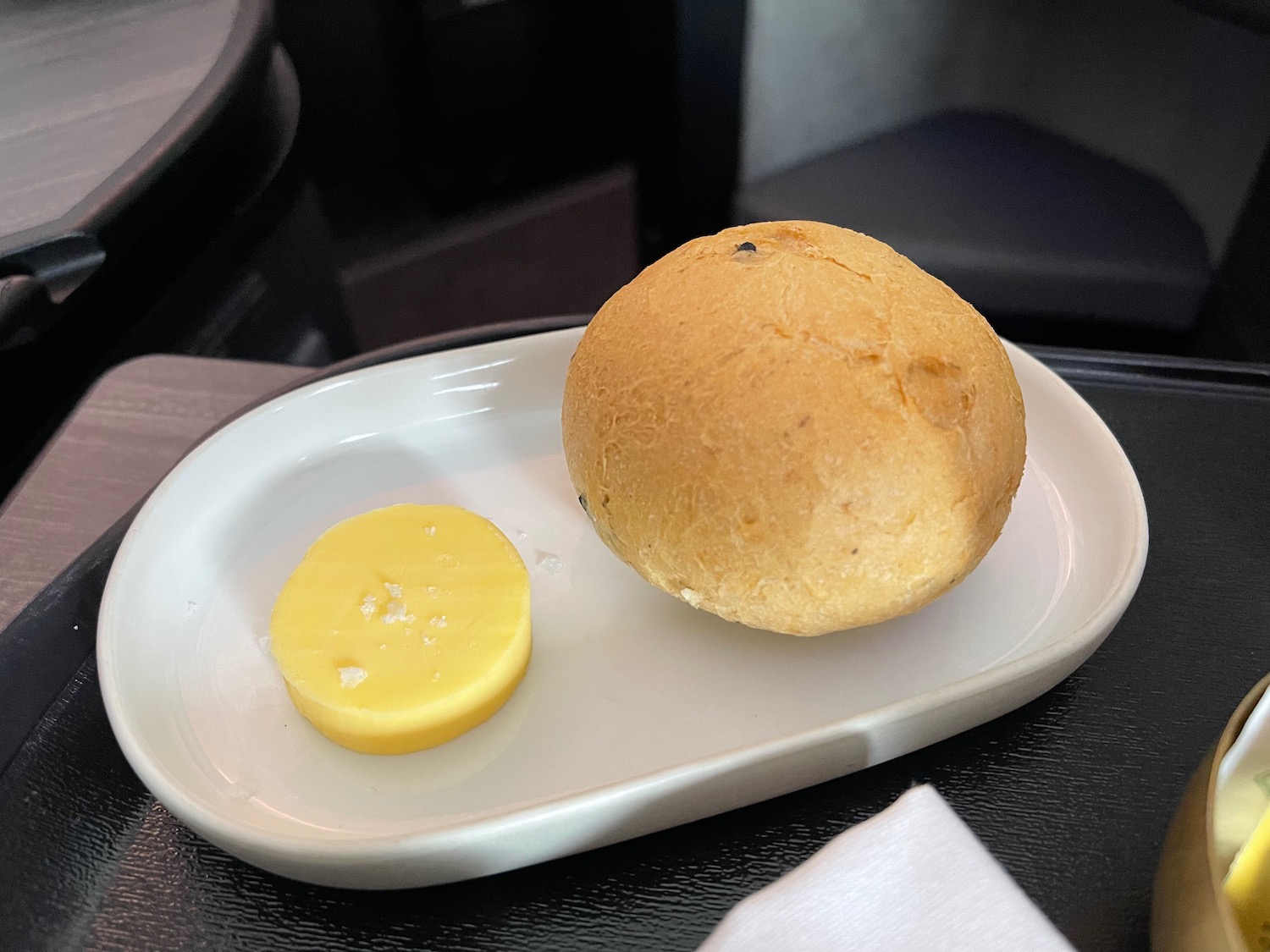 a plate with a piece of food on it