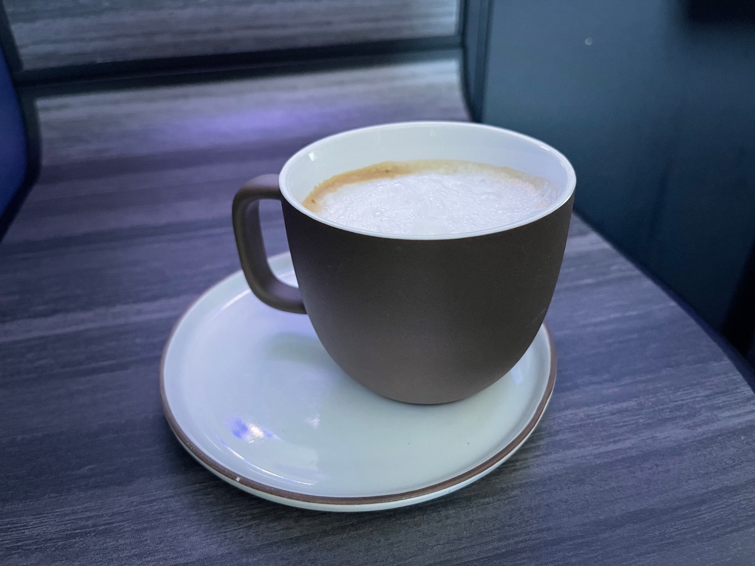 a cup of coffee on a saucer