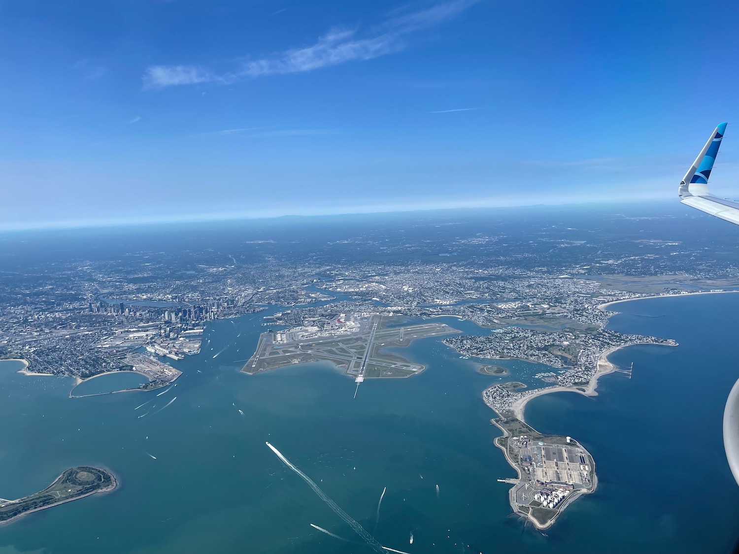 an aerial view of a city and water