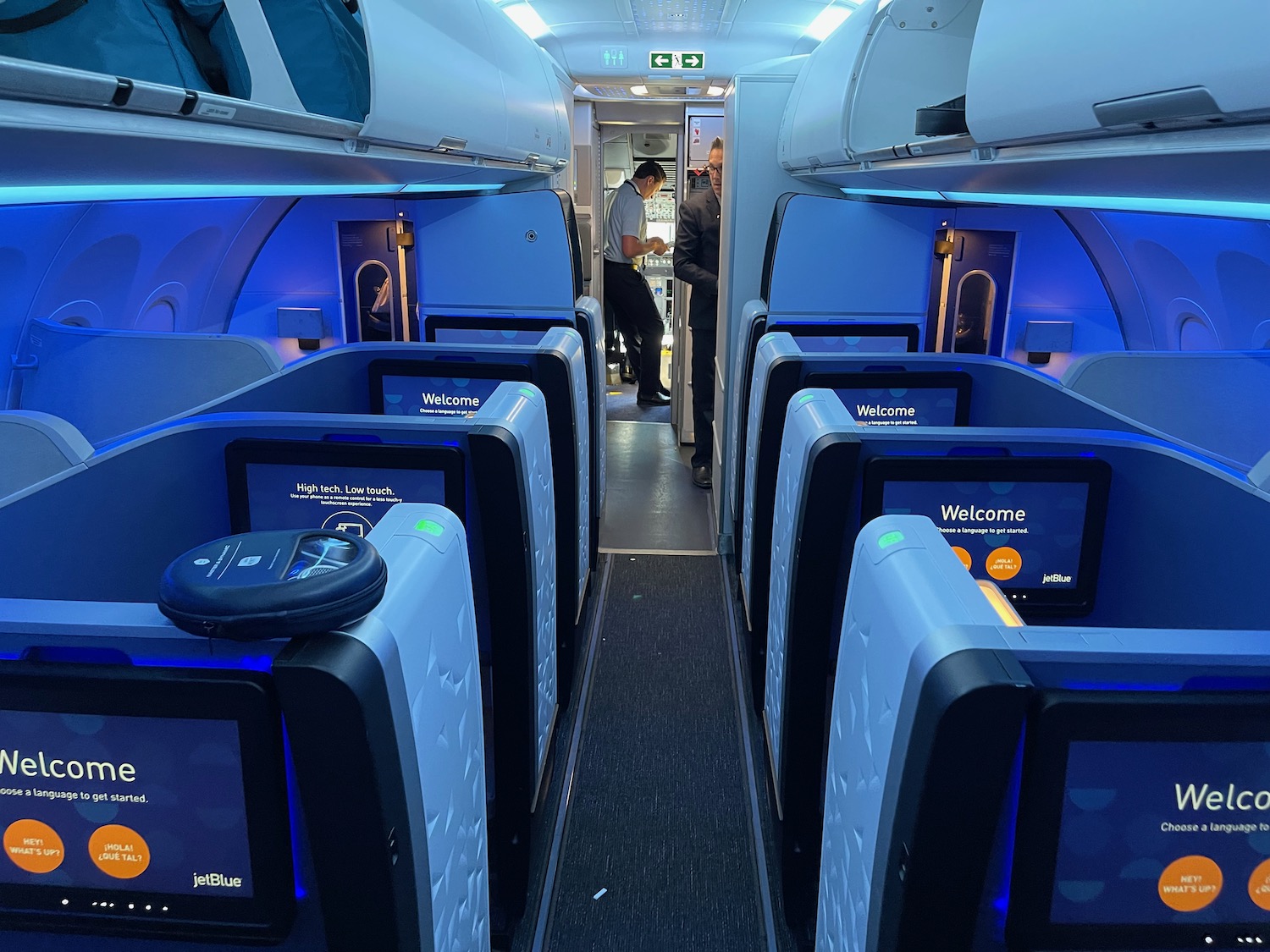 a inside of an airplane with blue lights