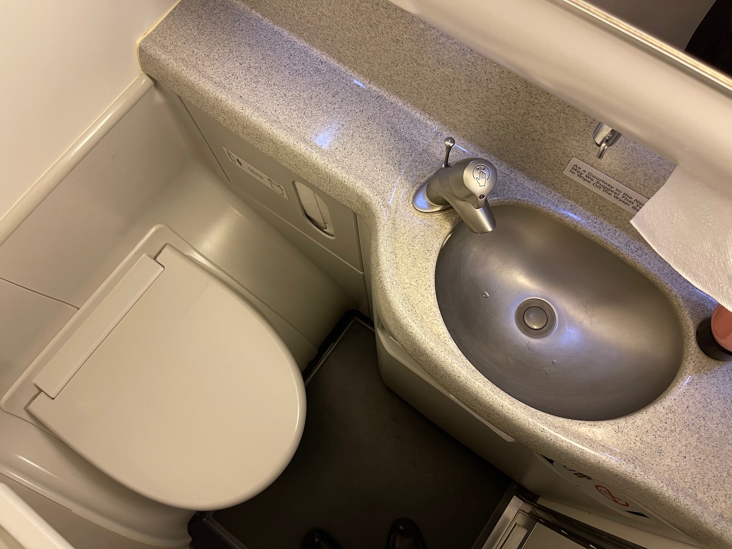 a sink and toilet in a bathroom