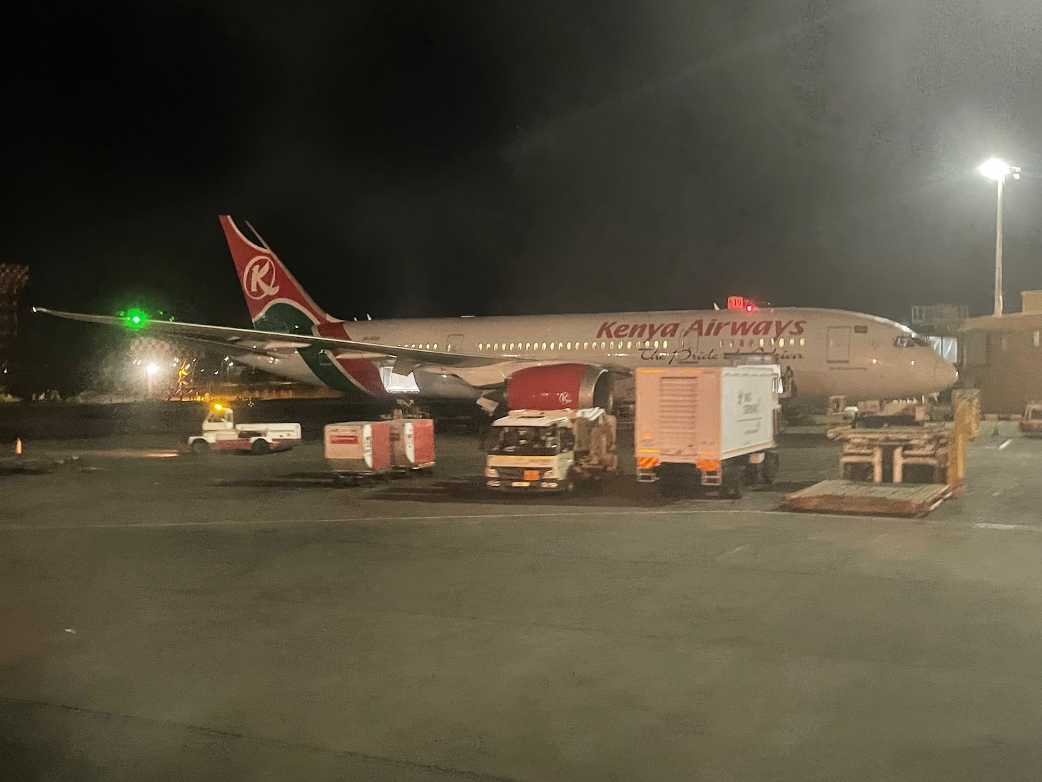 an airplane on the tarmac at night