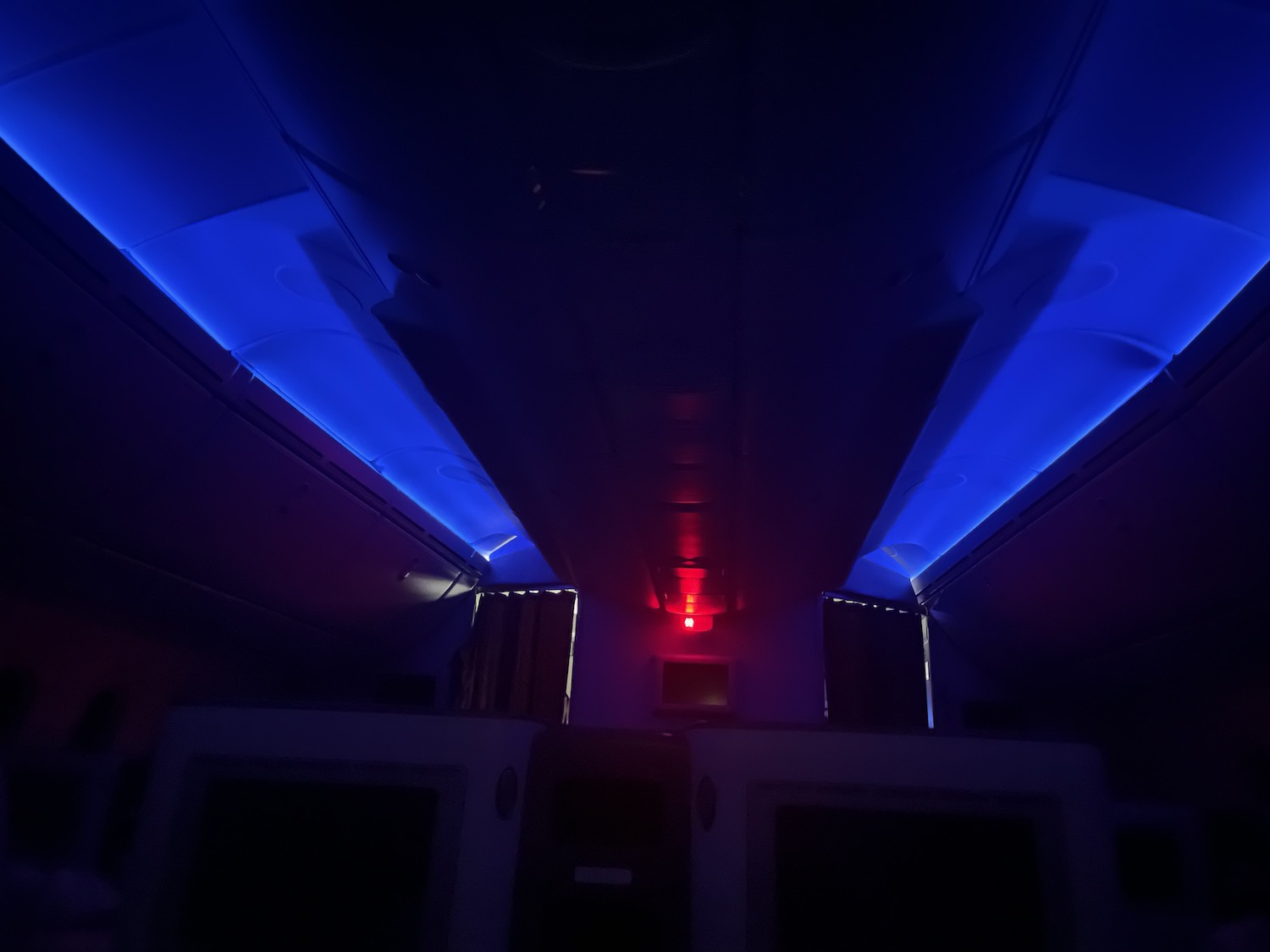 a blue and red light in a plane