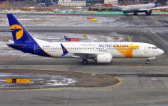 a large airplane on a runway