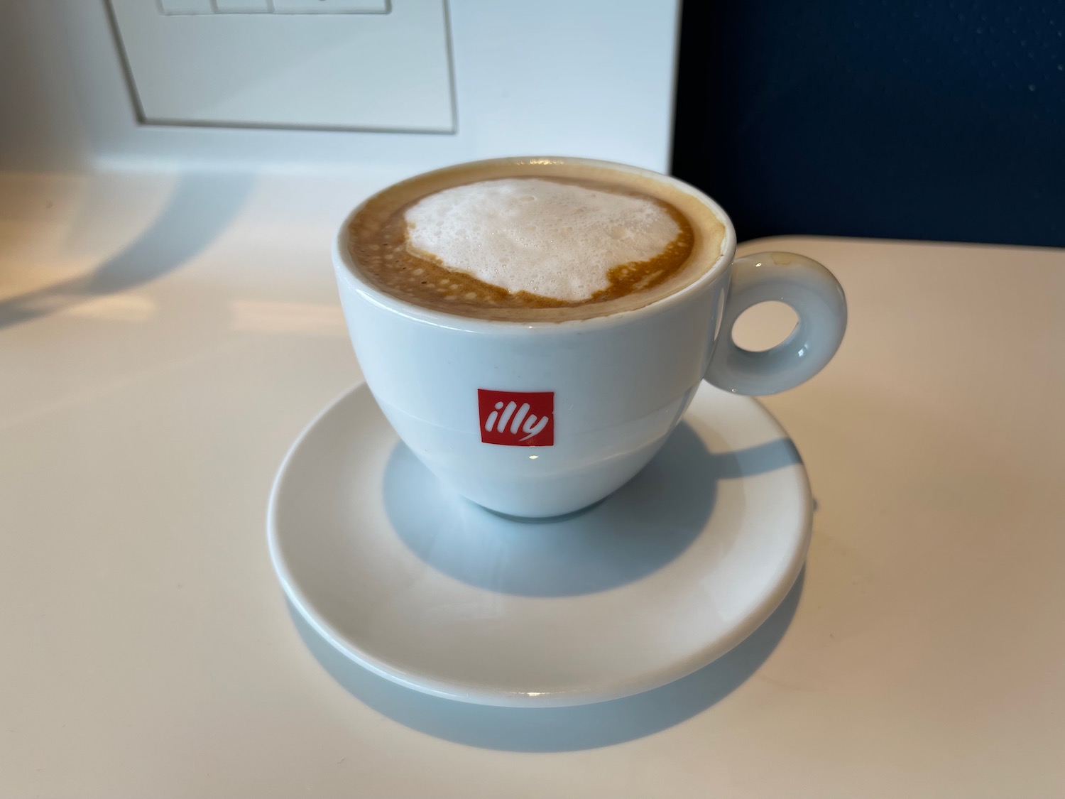 a cup of coffee on a saucer