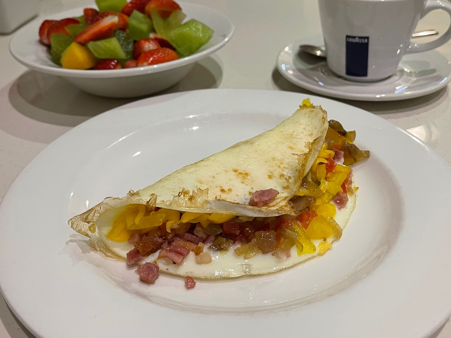 a breakfast burrito on a plate