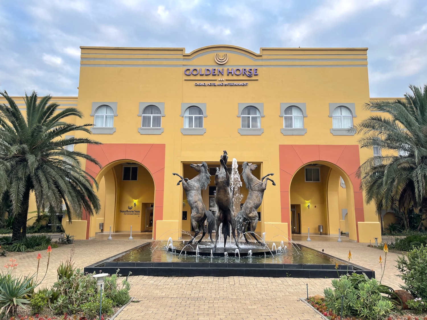 a building with a fountain in front of it