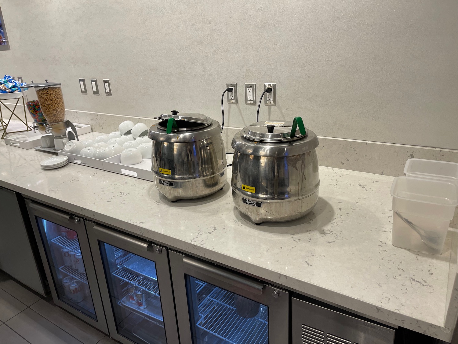 two large metal containers on a counter