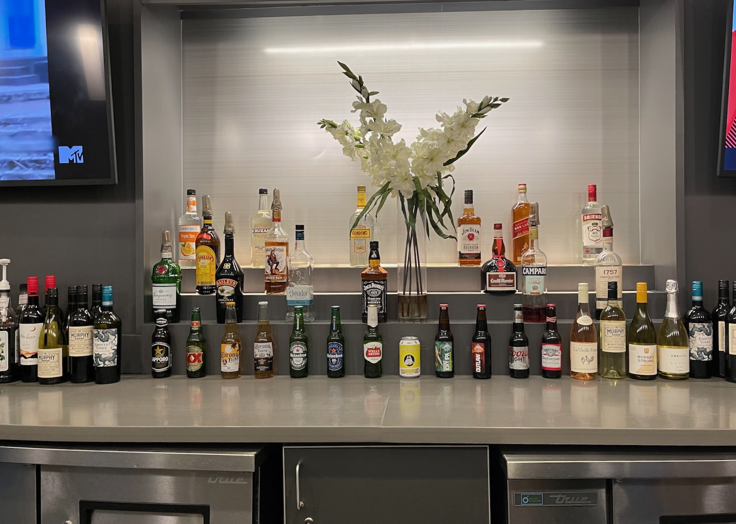 a group of bottles of alcohol on a counter