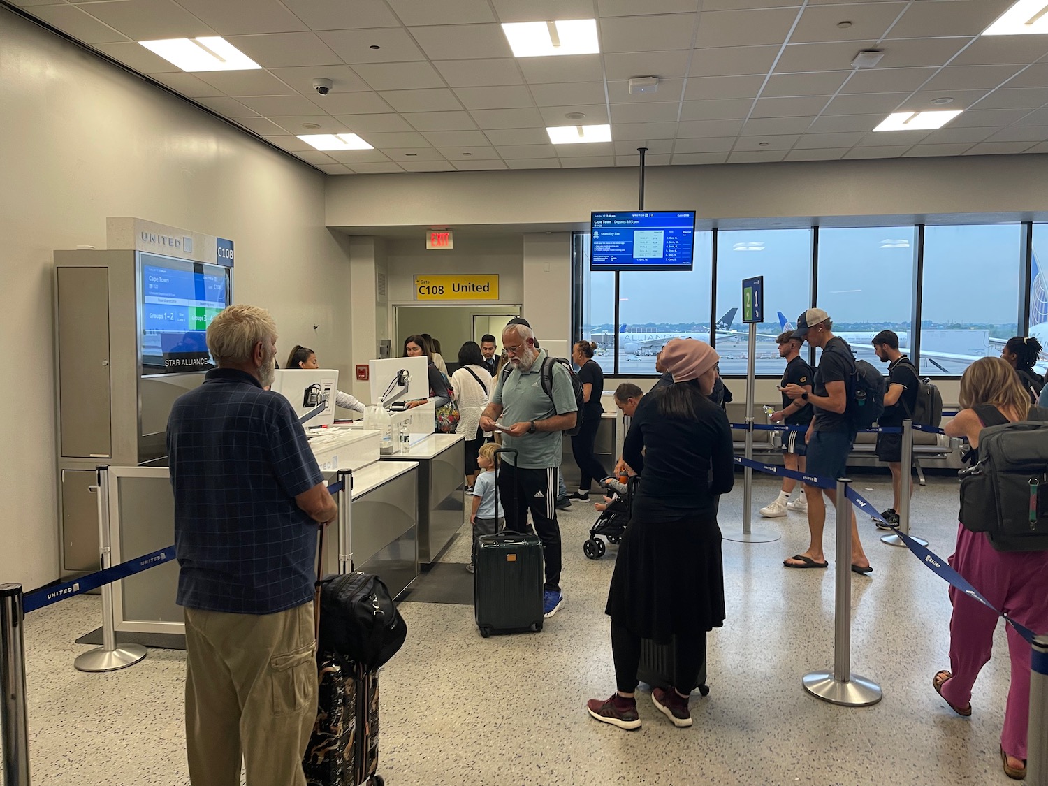 a group of people in an airport