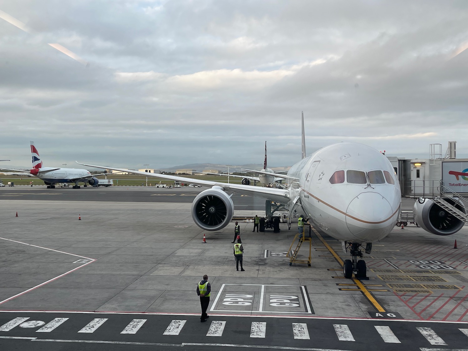 a large white airplane on a runway