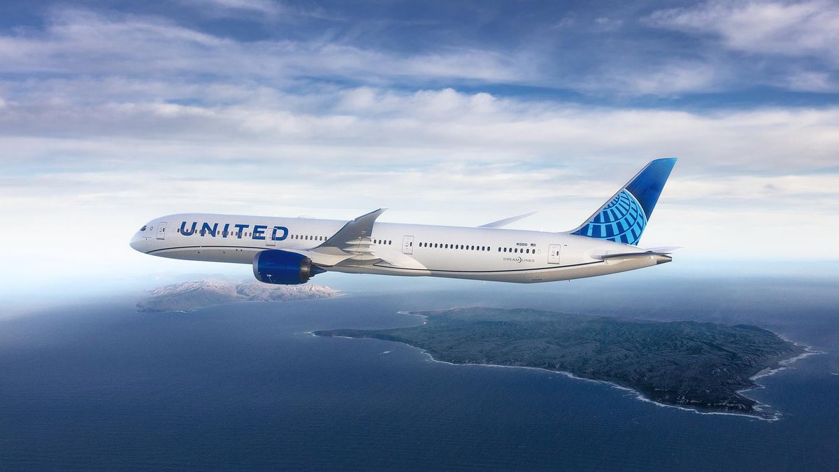 a plane flying over water