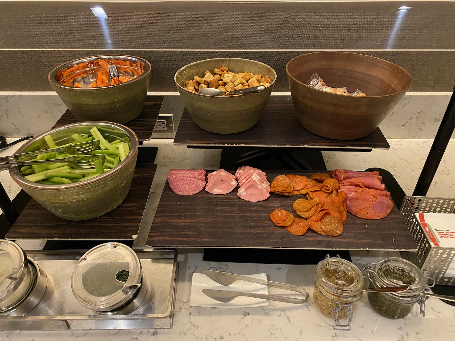 a trays of food on a counter